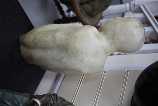 A carved alabaster model of a stylised figure, 20in.